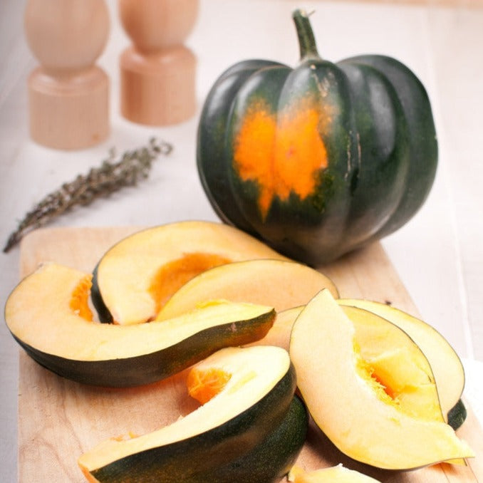 Winter Acorn squash from SeedsNow, fresh seeds for growing vibrant, edible Acorn squash with distinctive ridged green and orange skin.